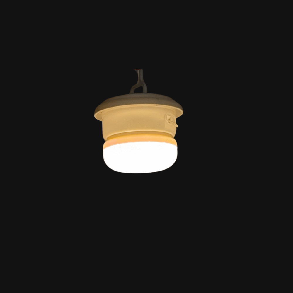Multifunctional solar-powered camping light with high, low, and SOS modes, featuring a retractable string of warm fairy lights