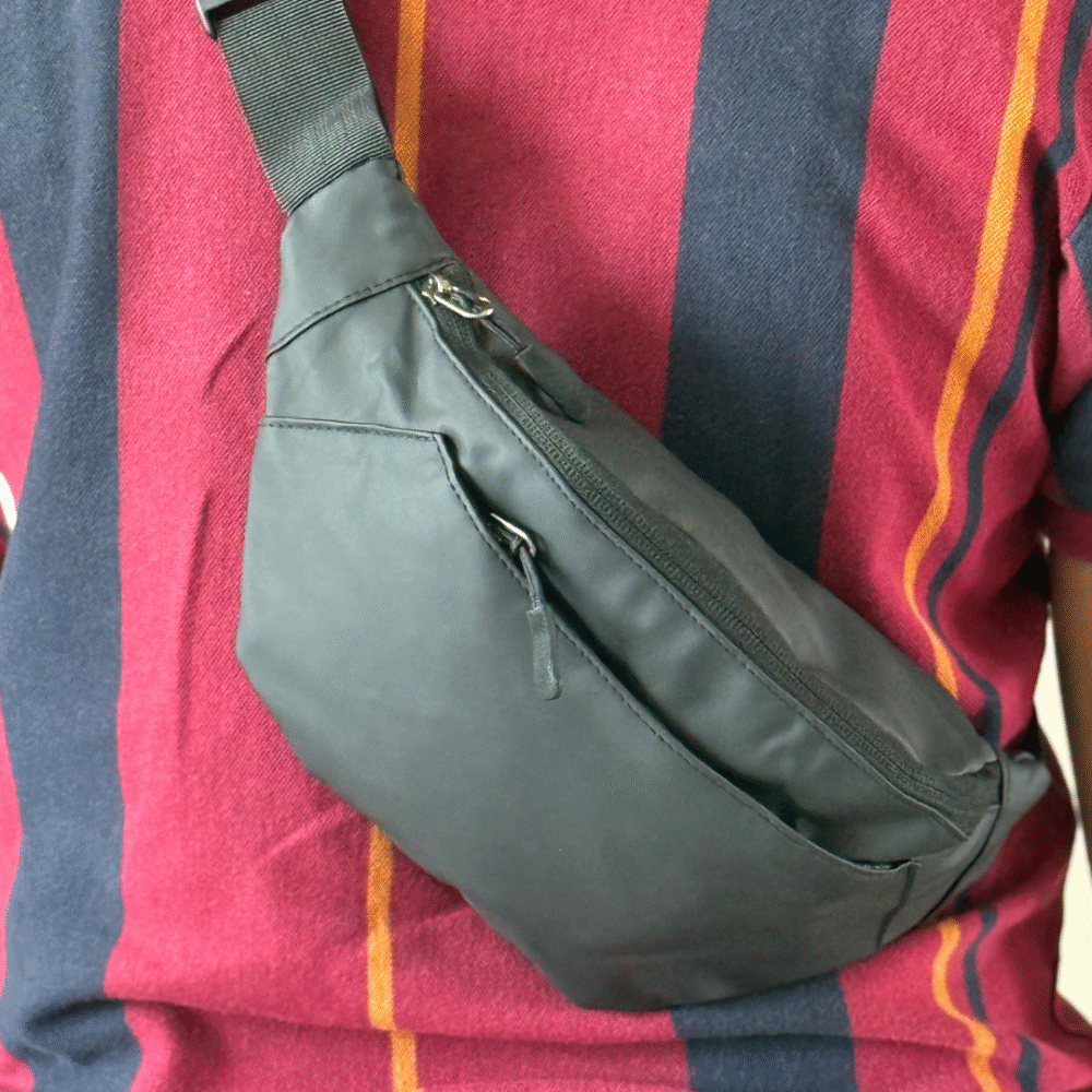 Spacious fanny pack showing organized storage for phone, wallet, keys, and accessories